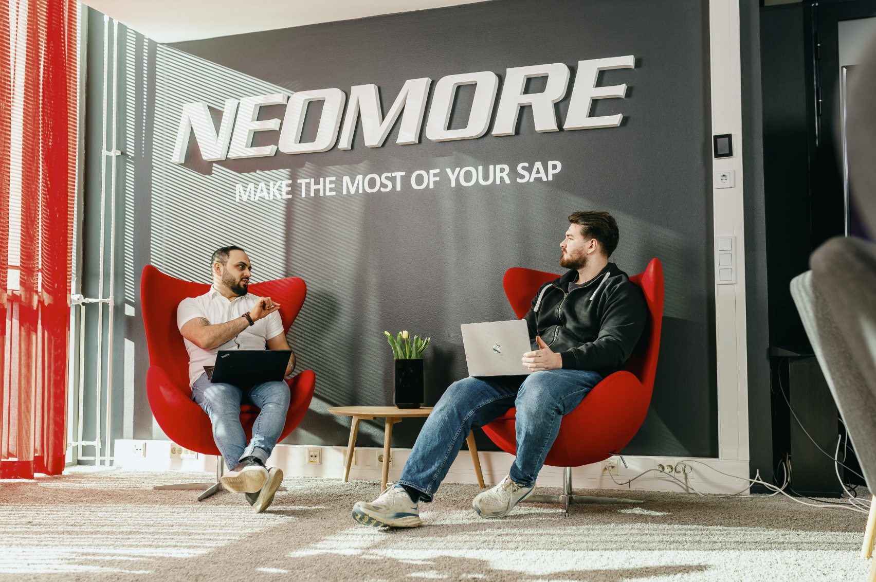 Neomore employees talking