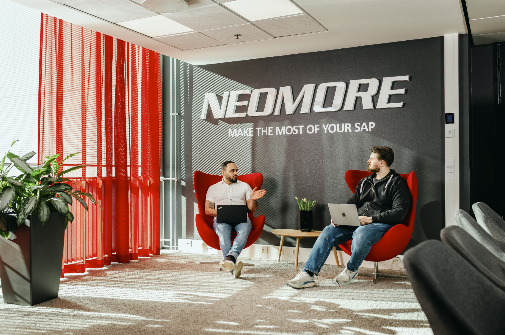 Neomore employees talking