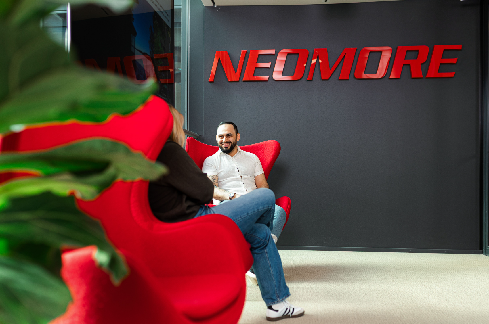 Neomore employees sitting
