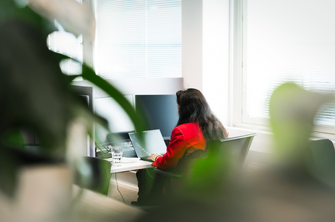 Neomore employee working on a computer